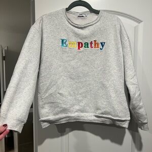 The Mayfair Group Gray Sweatshirt with Colorful 'Empathy' Embroidery